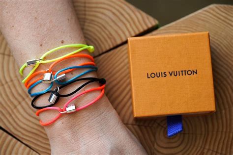 louis vuitton necklace unicef|Louis Vuitton UNICEF bracelet black.